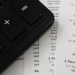 Immagine di un test di aritmetica con l'operazione 33−11−11 da risolvere.